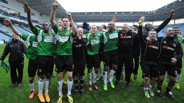 Worcester City's players celebrate at the final whistle at the Ricoh Arena