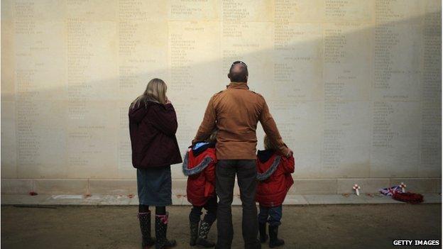 A family read the names