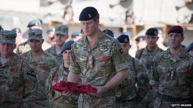 Prince Harry lays wreath