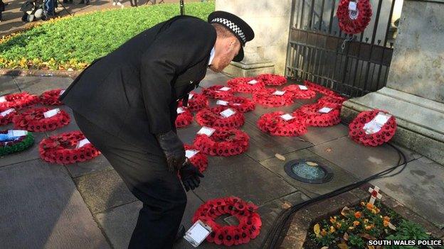 Deputy-Chief Matt Jukes lays a wreath on behalf of South Wales Police