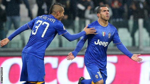 Carlos Tevez celebrates