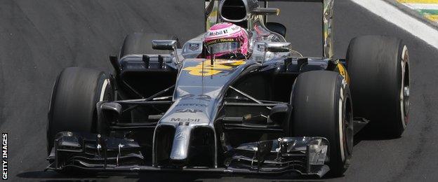 McLaren driver Jenson Button, of Britain, steers his car during the Formula One Brazilian Grand Prix at the Interlagos race track in Sao Paulo, Brazil, Sunday, Nov. 9, 2014.