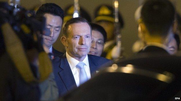 Australian Prime Minister Tony Abbott arrives at the Beijing International Airport - 9 November 2014