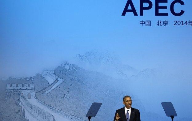 U.S. President Barack Obama speaks at the APEC CEO Summit, Monday, Nov. 10, 2014, in Beijing. (AP Photo/Andy Wong)