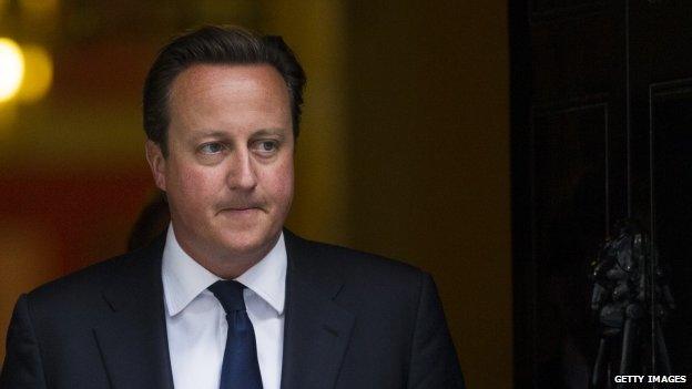 David Cameron leaving Downing Street with tense expression