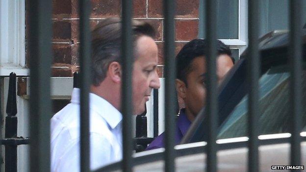 David Cameron leaving Downing Street by the back door