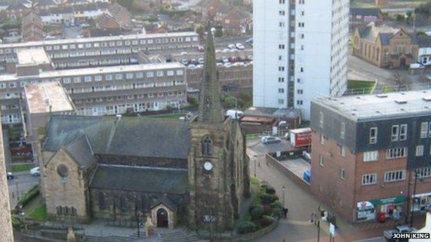 The maisonettes behind St Mary's Church, Flint