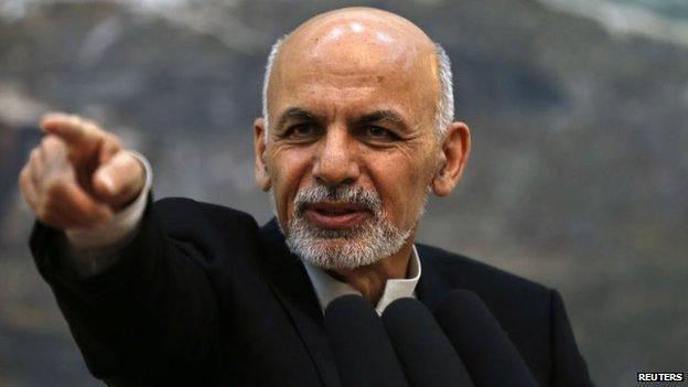 Afghanistan's President Ashraf Ghani points while speaking during a news conference in Kabul on 1 November 2014