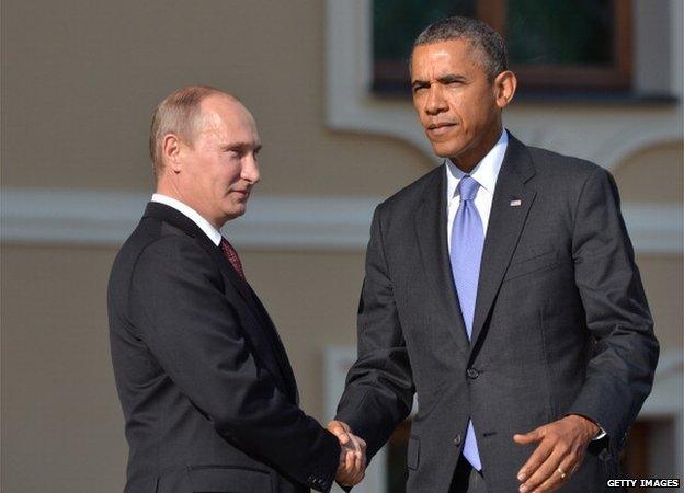 In this handout image provided by Host Photo Agency, Russian President Vladimir Putin (L) and U.S. President Barack Obama shake hands during an official welcome during the G20 Summit on September 5, 2013 in St. Petersburg, Russia.