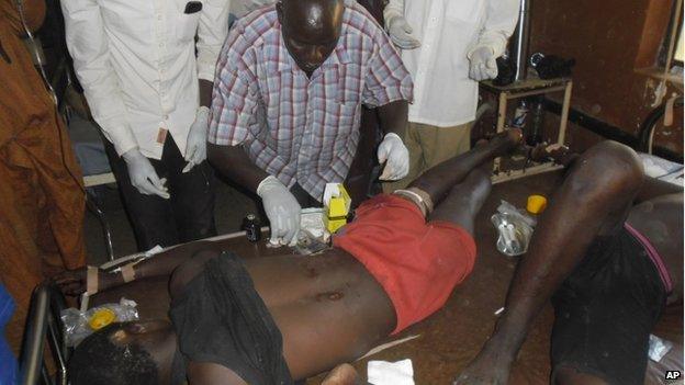 People are treated at the general hospital in Potiskum, Nigeria on 10 November 2014