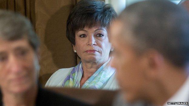 Valerie Jarrett listens to President Obama speak.