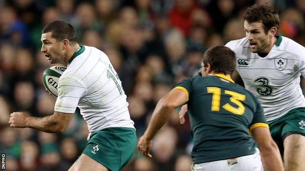 Rob Kearney bursts past South Africa's Jan Serfontein last Saturday