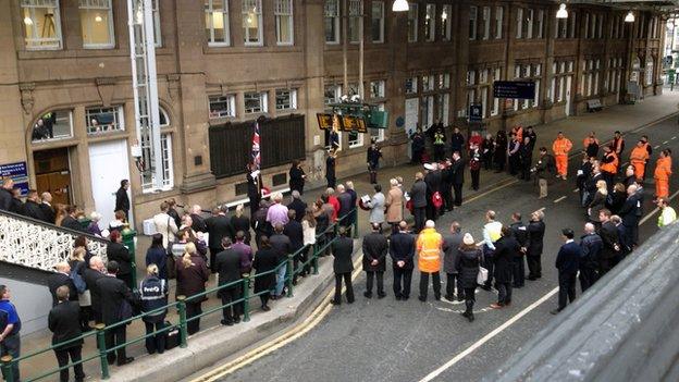 Wreaths are laid at Edinburgh's Waverley Station