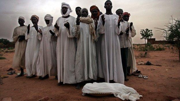 Relatives mourn the death of an infant, who died as a result of malnutrition (Getty Images)