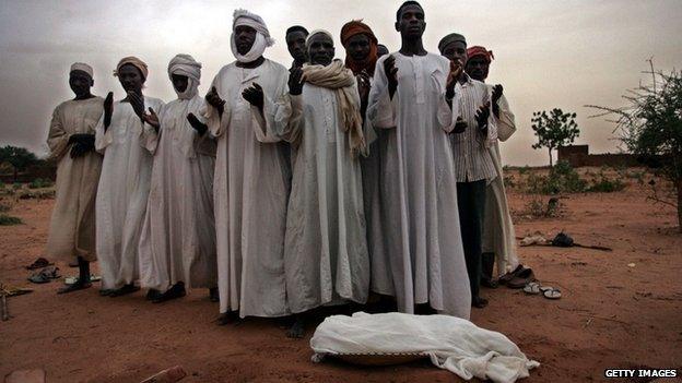 Relatives mourn the death of an infant, who died as a result of malnutrition (Getty Images)