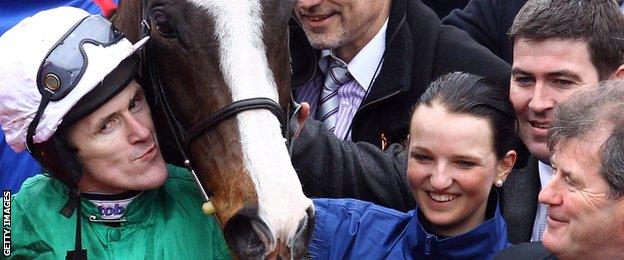 AP McCoy celebrates his win on Synchronised, at the Cheltenham Gold Cup 2012