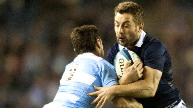 Scotland's Greig Laidlaw (right) in action against Argentina