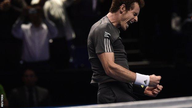 Andy Murray celebrates beating Milos Raonic