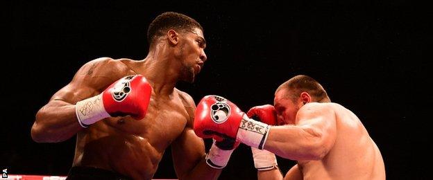 Anthony Joshua and Denis Bakhtov