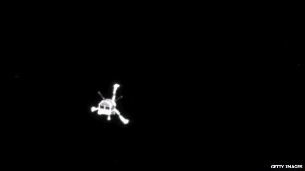 The Philae lander is pictured on its way to the comet, in this handout photo provided by the European Space Agency, 12 November 2014