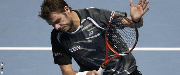 Wawrinka can only applaud another Djokovic passing shot