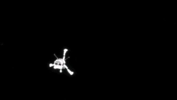 The Philae lander is pictured on its way to the comet, in this handout photo provided by the European Space Agency, 12 November 2014