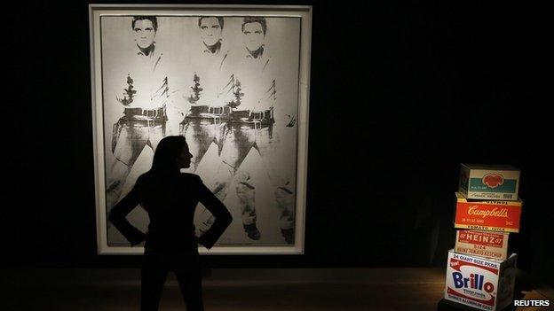 Triple Elvis by Andy Warhol