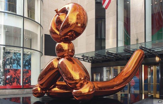 Balloon Monkey (Orange) by Jeff Koons