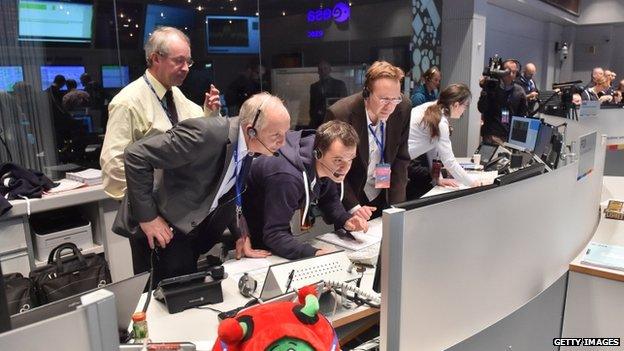 European Space Agency (ESA) The Rosetta mission crew monitors Philae successfully landing on comet 67P, at the European Operations Space Centre in Darmstadt, Germany