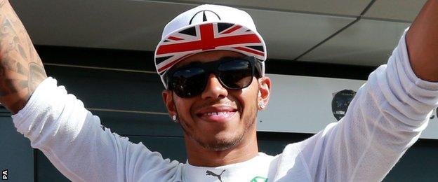 Lewis Hamilton celebrates winning the the 2014 British Grand Prix at Silverstone