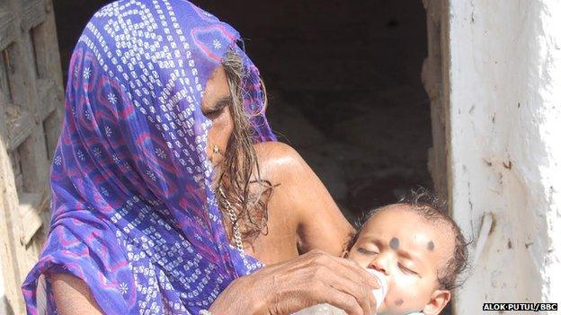 Rekha's grandmother with her baby