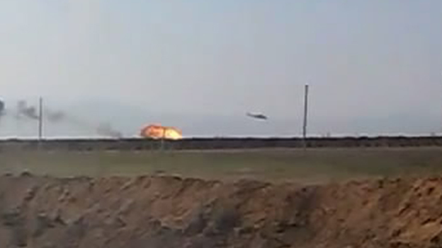 One of two Armenian helicopters in flames