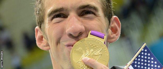 Michael Phelps after the podium ceremony of the men's 4x200m freestyle relay final during the swimming event at the London 2012 Olympic Games