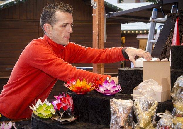 Ludovic Gaultier sets up his candle stall