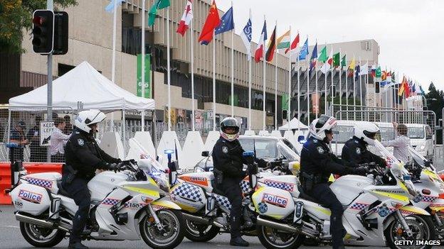 Police officers are seen at the car entrance of the Brisbane Convention and Exhibition Centre on 12 November 2014 in Brisbane, Australia.