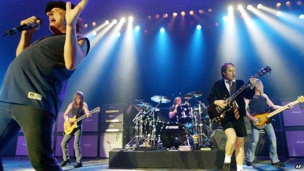 AC/DC (in 2003): Brian Johnson, Malcolm Young, Phil Rudd, Angus Young, and Cliff Williams