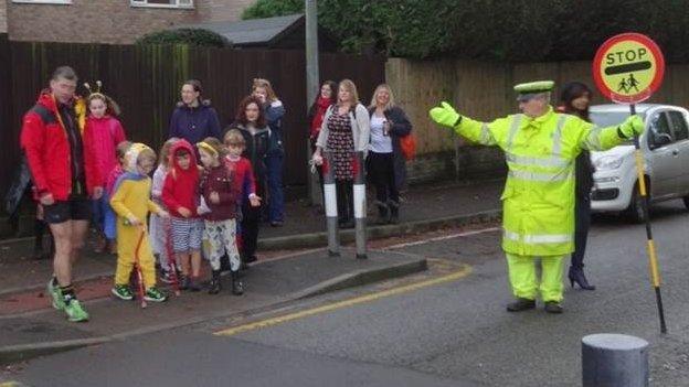 Parents joined the walk behind the group of youngsters