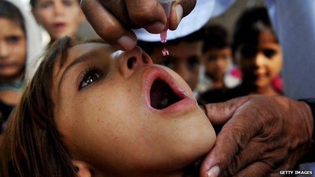 Girl being vaccinated