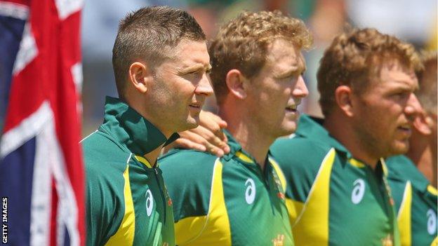 Australia captain Michael Clarke and team-mates at the anthems