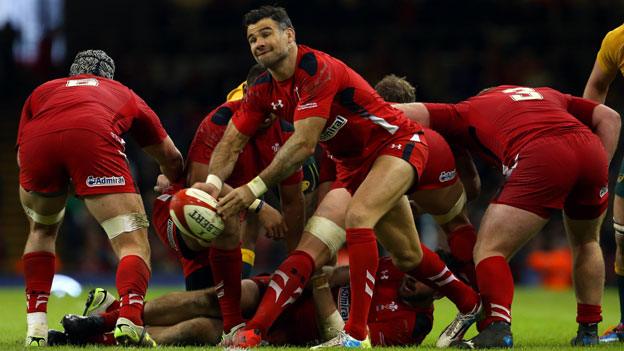 Mike Phillips passes the ball from the base of a scrum