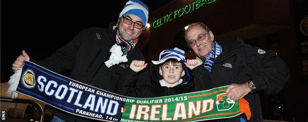 Fans wave a Scotland and Ireland combined scarf before kick-off