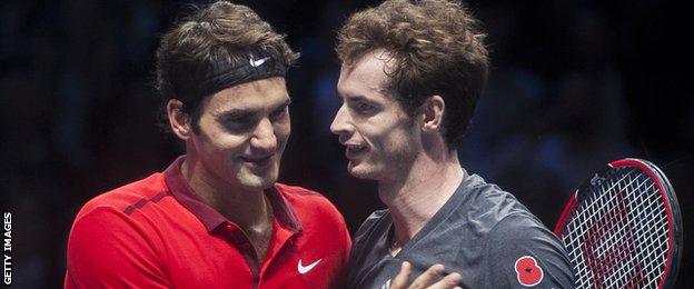 Roger Federer consoles Andy Murray after his defeat at the ATP World Finals