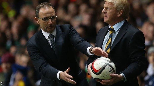 Martin O'Neill is about to grab the ball off Gordon Strachan during Friday's game