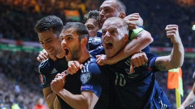 Scotland celebrates the goal at Celtic Park