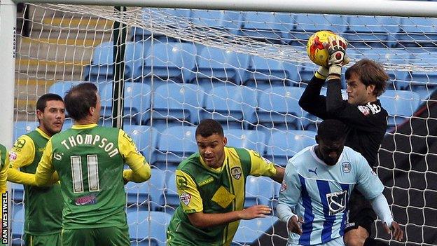 Roy Carroll leaps to take a catch in Notts County's win away against Coventry