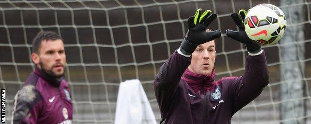 England goalkeepers Ben Foster and Joe Hart in training