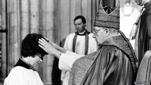 April 1987: Dr Robert Runcie, Archbishop of Canterbury, ordains the first women deacons in Canterbury Cathedral, Kent.