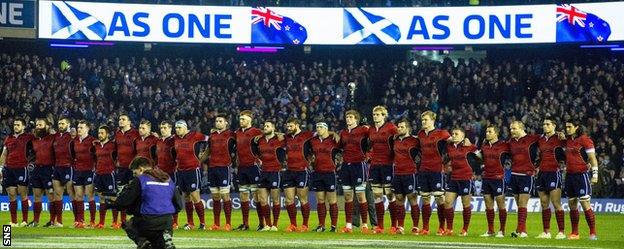 Scotland line-up arm in arm before kick-off