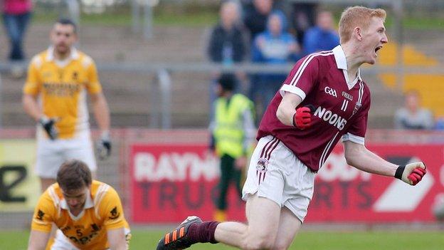 Christopher Bradley runs away in delight after scoring Slaughtneil's goal against Clontibret