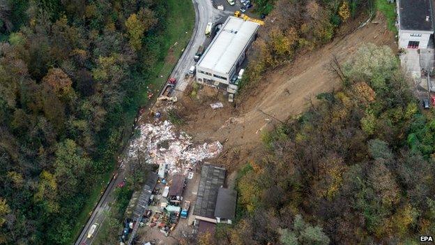 An aerial view of the site of a landslide in Davesco-Soragno near Lugano, Switzerland, on 16 November 2014.